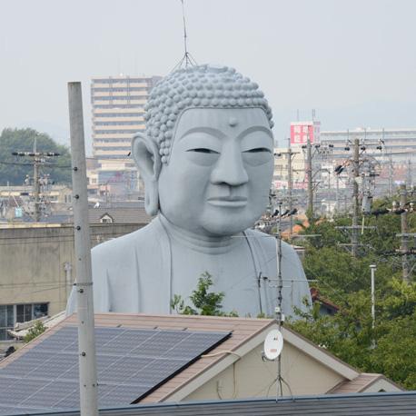 A gigantic Buddha statue in the middle of residential area in Nagoya